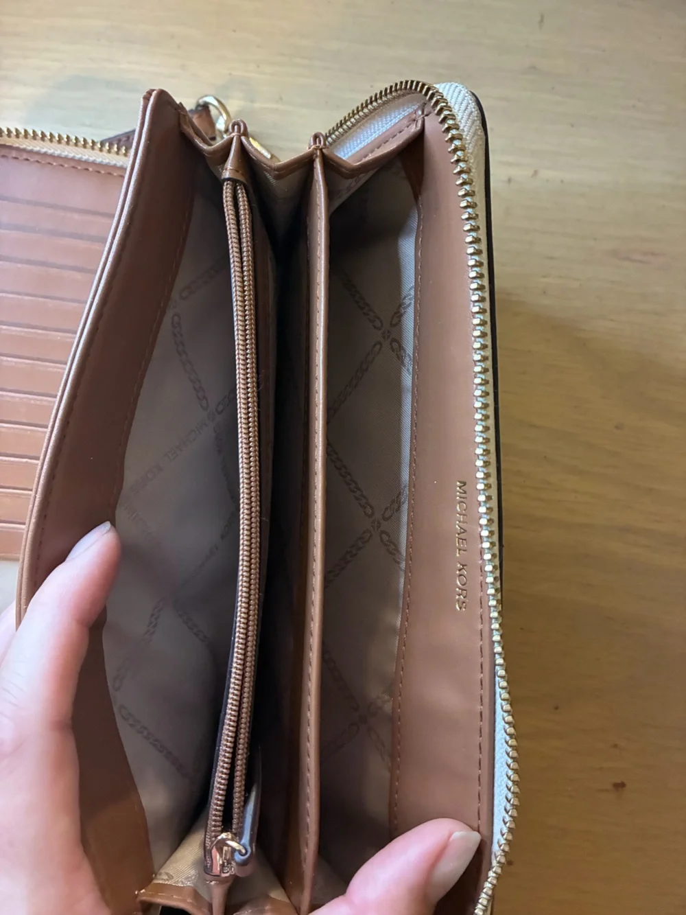 Michael Kors Silver Metallic Logo Zip Wristlet with Brown Strap